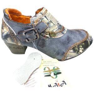 TMA Eyes Women's 6.5 Shooties Newsprint Patchwork  Distressed Heels